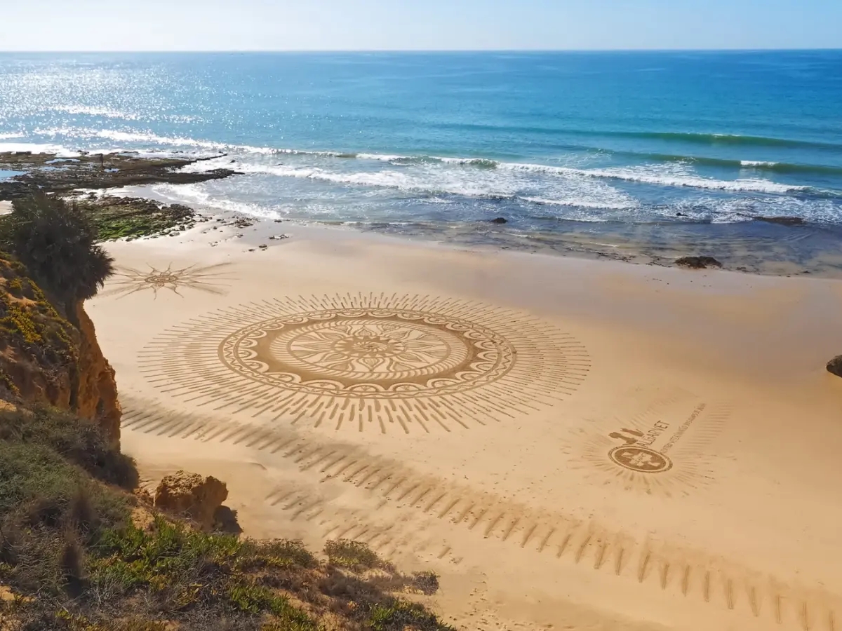 Vítor Raposo creates beautiful sand art at the beaches in the Algarve